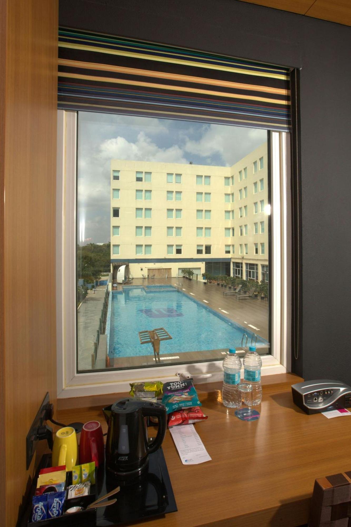 Отель Aloft Bengaluru Whitefield Экстерьер фото